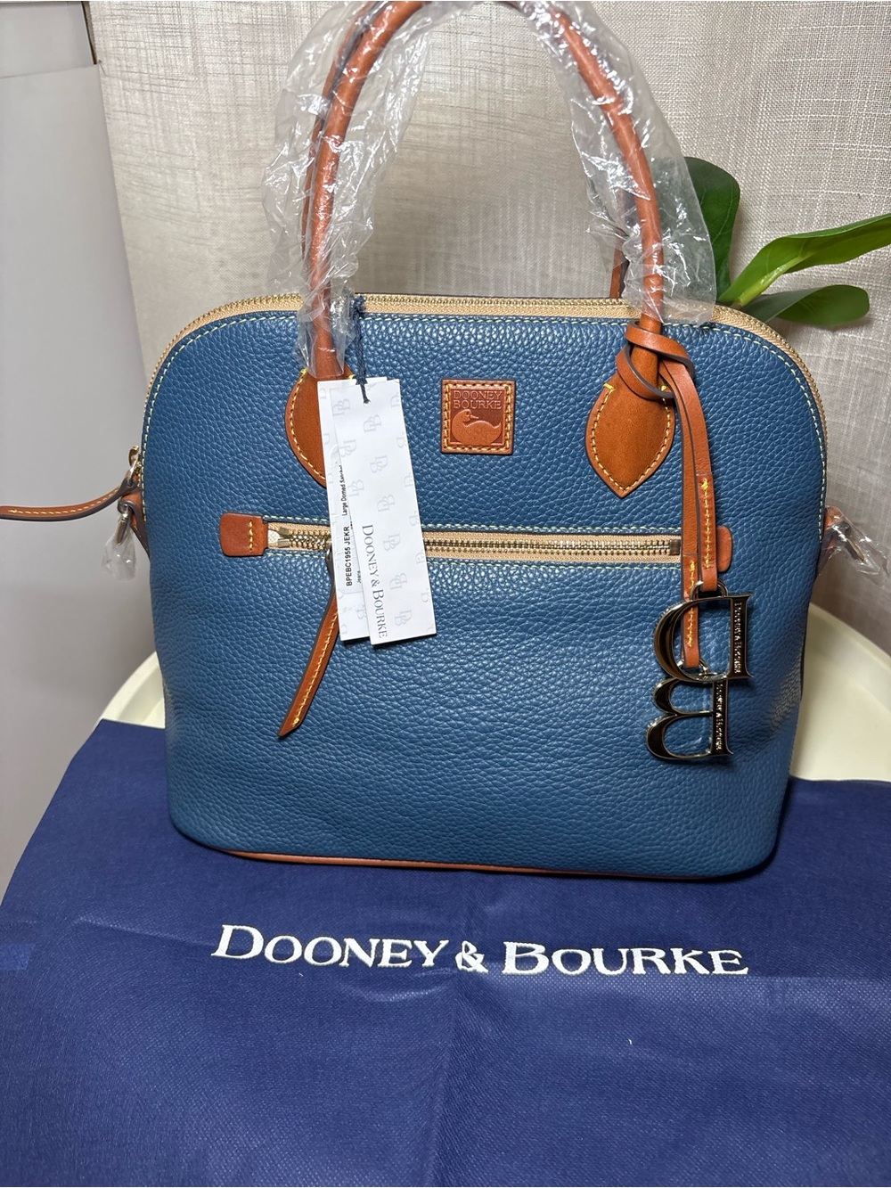 Dooney & Bourke Blue Pebble Leather Satchel with Tan Trim